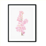 Sakura Ni painting in black frame.