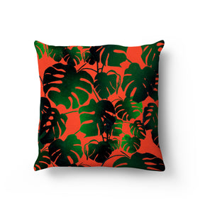 Cheese plant print originally hand printed lino cut design. Bright orange background contrasts with the ombre of dark to light green cheese plant leaves.