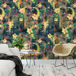 Rock paper flower wallpaper displayed in a bedroom setting with bedside table and woven chair