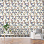 Wild heather wallpaper design represented on a living room wall along with a white sofa and table with green plants on. 